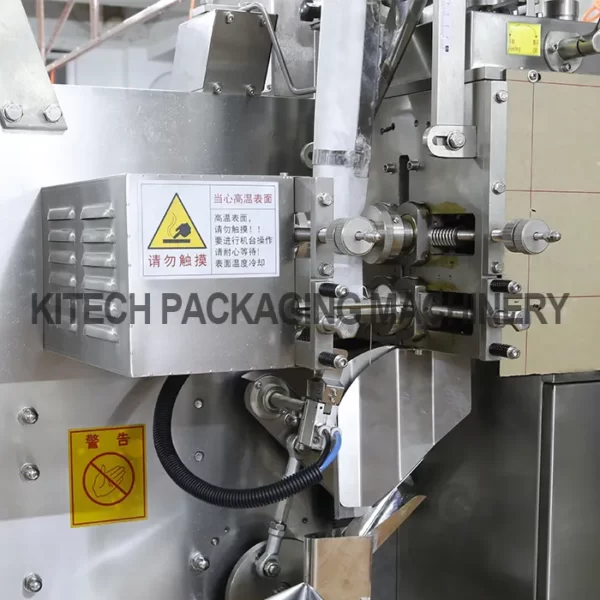 Tea packing machine with product label and packaging material.